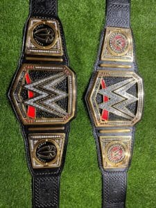 Close-up of WWE World Heavyweight replica belt 16MM CNC center plate with 24K gold plating cubic zirconia stones and deep etching