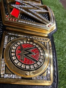 Side plate view of WWE World Heavyweight replica belt ultra deluxe 16MM CNC dual gold plating cubic zirconia custom design Absolute Belts