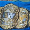 AEW World Championship Replica Belt full view – 4-layer zinc gold plated stones
