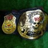 Side profile of WWF Smoking Skull Championship Belt showing thickness of 4mm zinc plates and leather strap depth