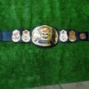 WWF Smoking Skull Championship Belt displayed flat showing full 52-inch length with all plates and complete strap
