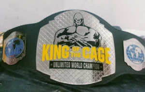 King of the Cage KOTC MMA Wrestling Championship Belt full view gold plated black leather