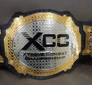 XCC MMA Championship belt close plate view - 2mm dual plated metal etching
