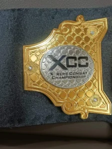 XCC MMA Championship belt custom side plates view - personalized wrestling title