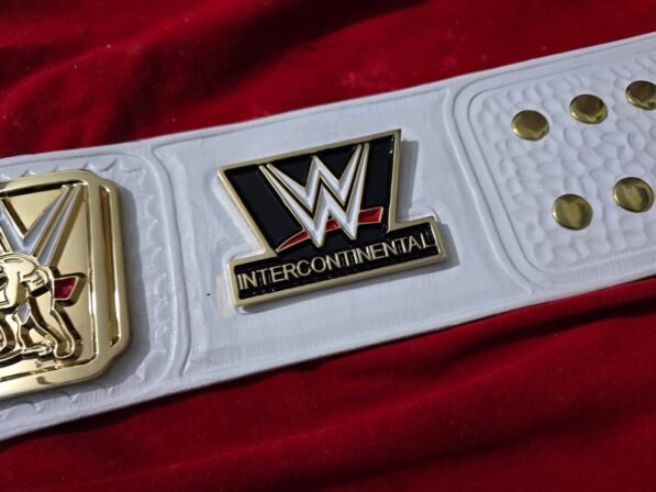 WWE Intercontinental Championship Belt strap view showing 6mm genuine cowhide leather texture, snap fasteners, and 50-inch length detail
