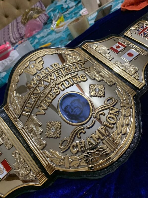 WWF Hulk Hogan championship belt center plate showing 4mm brass construction and gold plating detail
