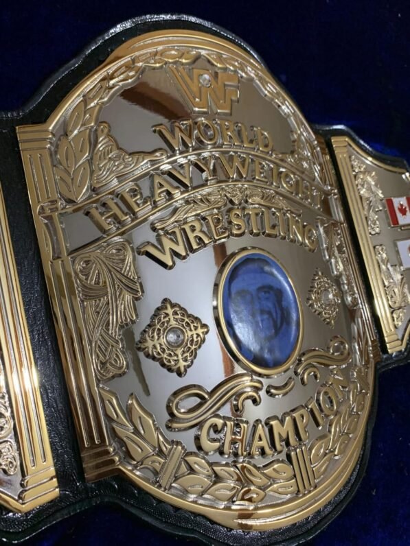 WWF Hulk Hogan championship belt center plate showing 4mm brass construction and gold plating detail