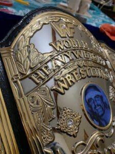 WWF Hulk Hogan championship belt center plate showing 4mm brass construction and gold plating detail