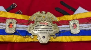 Muhammad Ali Ring Magazine Championship Belt center plate close up gold etching detail