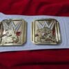 WWE Intercontinental Championship Belt strap view showing 6mm genuine cowhide leather texture, snap fasteners, and 50-inch length detail