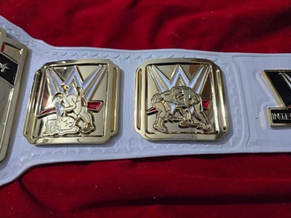 WWE Intercontinental Championship Belt strap view showing 6mm genuine cowhide leather texture, snap fasteners, and 50-inch length detail