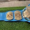 WWF Winged Eagle Championship Belt strap view showing 4mm blue genuine leather texture, snap fasteners, and 50-inch length detail