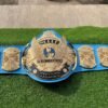 WWF Winged Eagle Championship Belt full layout showing complete 50-inch length with winged eagle plate, side plates, blue leather, CNC details