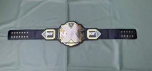 WWE NXT championship belt replica full view with gold plating and leather strap