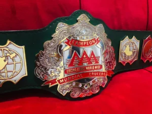 AAA Lucha Libre championship belt brass plate close view gold plating etching detail