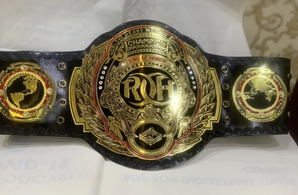 ROH Championship Belt center plate 2mm brass with gold finish detail closeup