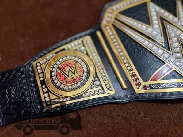 WWE World Heavyweight Championship Belt side profile showing genuine leather strap thickness, 2mm brass plate depth, and snap closure system