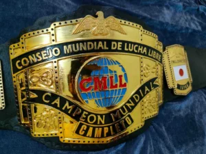 CMLL Lucha Libre championship replica belt brass plate close view gold etching detail