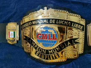 CMLL Lucha Libre championship replica belt brass plate close view gold etching detail
