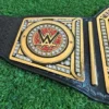 WWE Undisputed Championship Belt side profile showing genuine leather strap thickness, 2mm brass plate depth, and snap closure system