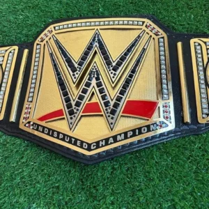WWE Undisputed Championship Belt front view showing center plate with gold finish, 2mm brass construction, and authentic champion design
