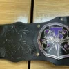 Undertaker Championship Belt side profile showing genuine leather strap thickness, brass plate depth, and snap closure system"