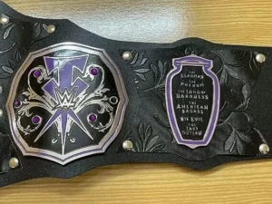 Undertaker Championship Belt side profile showing genuine leather strap thickness, brass plate depth, and snap closure system"