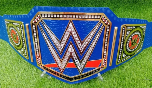 Blue universal belt 2mm brass metal plates with authentic WWE championship design close up detail