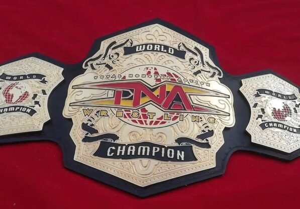 TNA Championship Belts with the red Background.