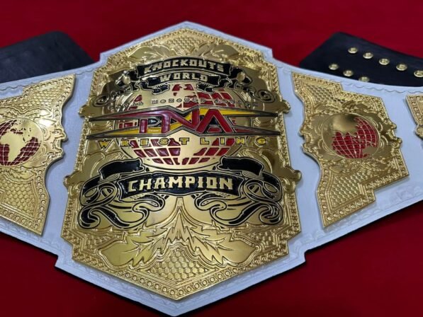 TNA Knockouts Championship center plate 4mm brass gold plating women's belt detail closeup