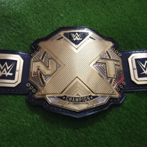 NXT championship belt close plate view gold zinc alloy black etching