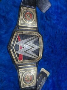 WWE World Heavyweight Championship replica belt with black leather strap and gold zinc plates by Absolute Belts